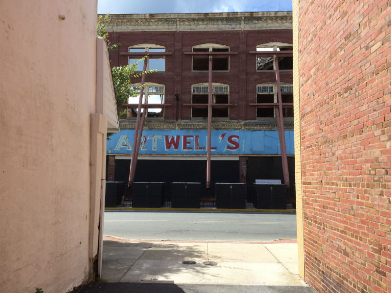 Artwell's sign on the Hearn Hardware Building. Photo by Meagan Baco.