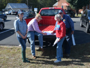 Members of the Coalition to Protect Maryland Burial Sites review the plot map, 2017.