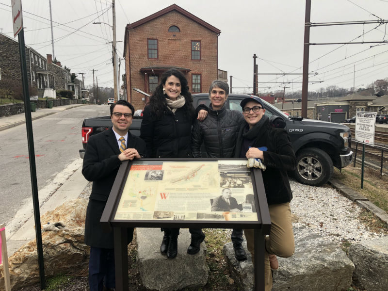 Preservation Maryland staff at the Park Mill sign, 2018.