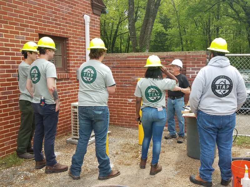 Traditional Trade Apprenticeship Program students learning masonry. Photo by National Preservation Training Center.