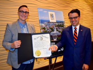 Meagan Baco and Nicholas Redding accept an Historic Annapolis award for PreserveCast, 2019.