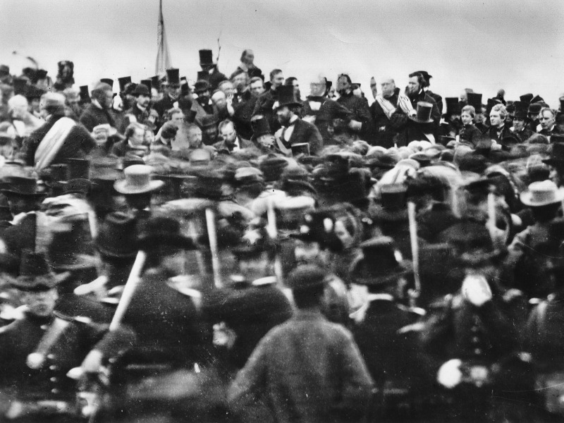 Photograph of speakers (and President Lincoln at center) the dedication of the Soldiers' National Cemetery, Gettysburg, Pennsylvania, November 19, 1863.